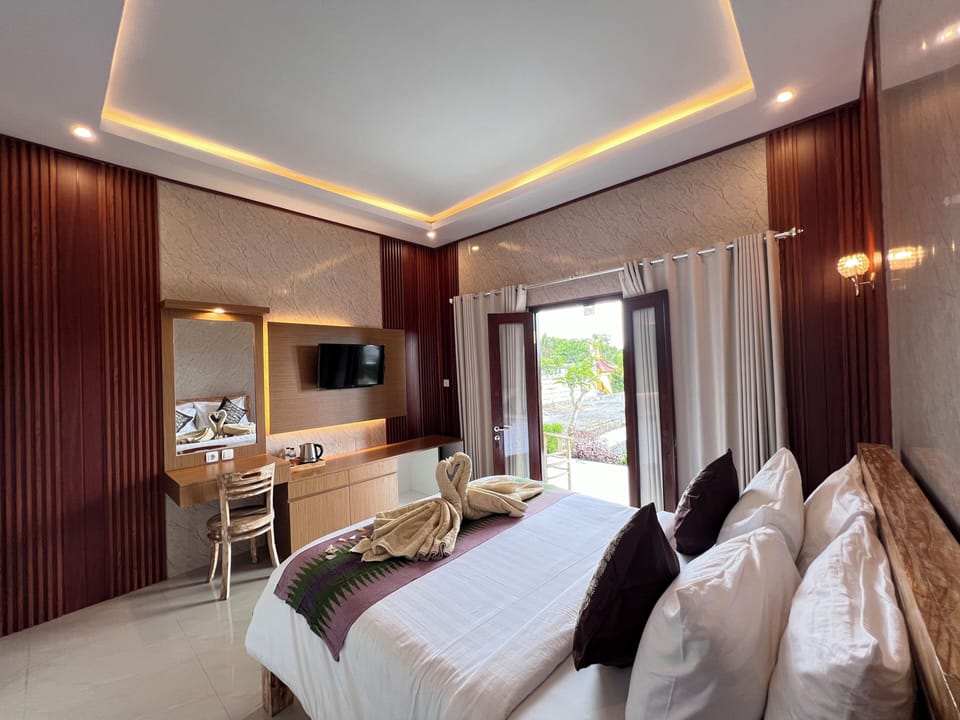Deluxe Double or Twin Room, Pool View | In-room safe, desk, laptop workspace, blackout drapes