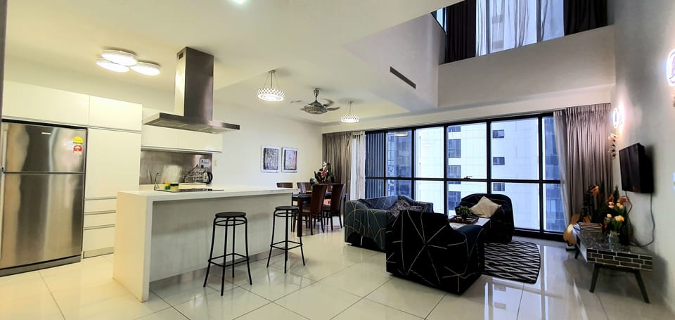Premium Condo, 2 Bedrooms, Refrigerator & Microwave, Garden View | Living area | 43-inch Smart TV with digital channels, TV, Netflix
