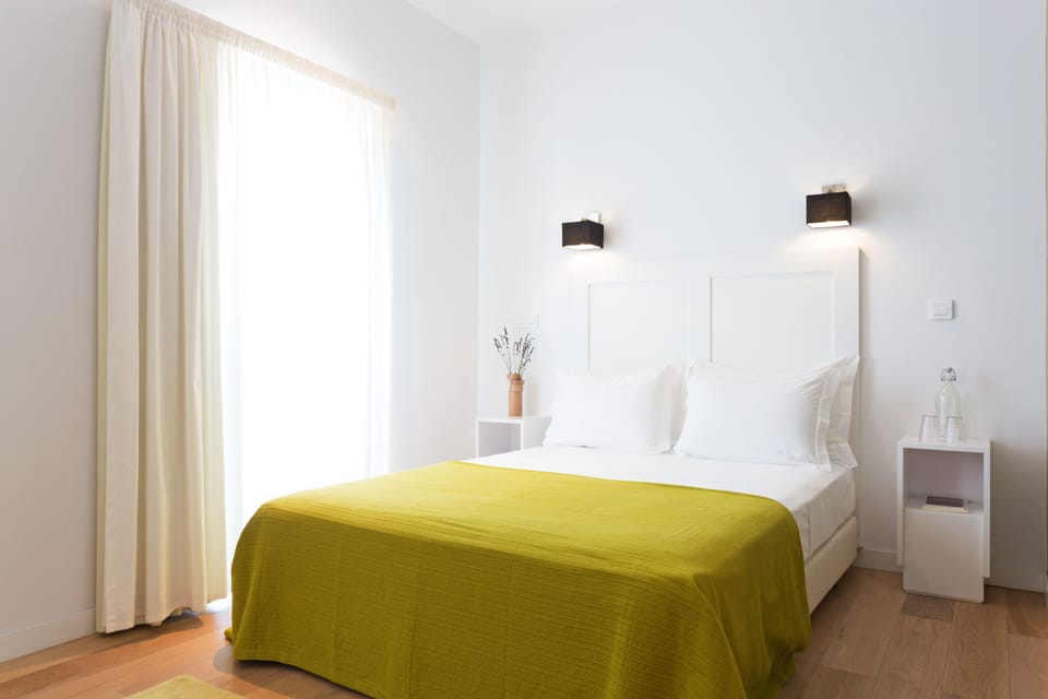 Double Room | Desk, blackout drapes, iron/ironing board, bed sheets