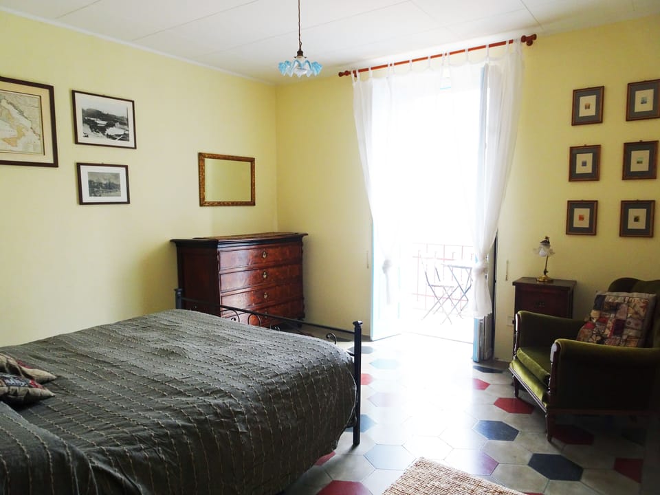 Double Room, Private Bathroom (External Shared Shower) | Desk, iron/ironing board, free WiFi, bed sheets
