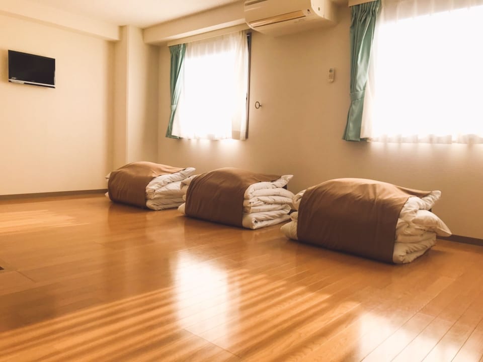 Family Room, Non Smoking, Shared Bathroom | Iron/ironing board (on request), WiFi (free)
