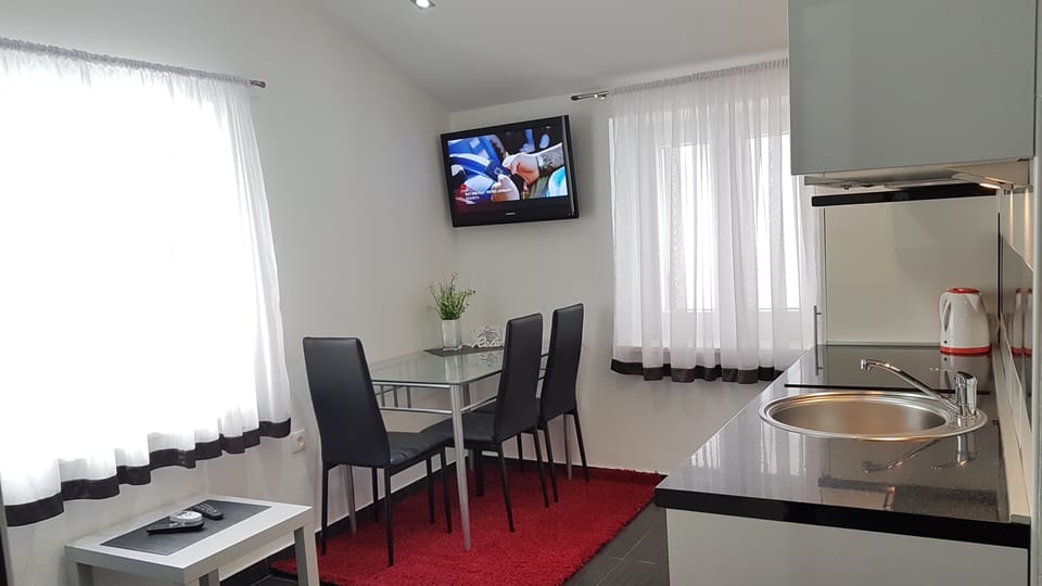 Superior Apartment, 1 Bedroom | Living area | Flat-screen TV