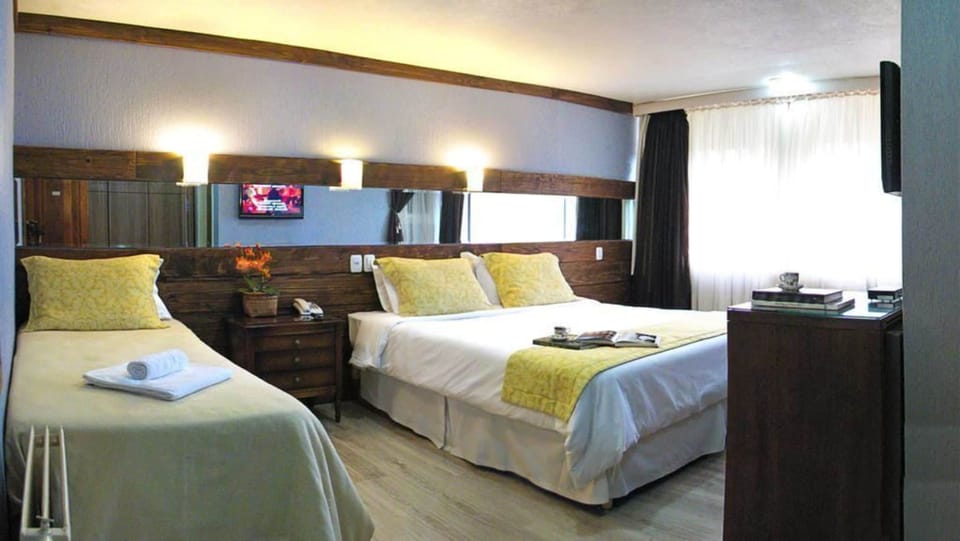 Deluxe Triple Room | Minibar, free WiFi