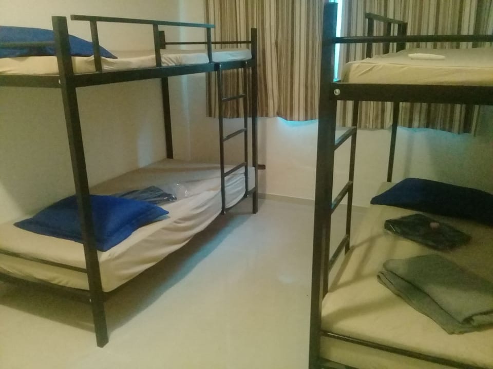 Blackout drapes, iron/ironing board, free WiFi, bed sheets