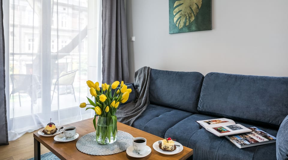 Deluxe Apartment | Living room | Flat-screen TV