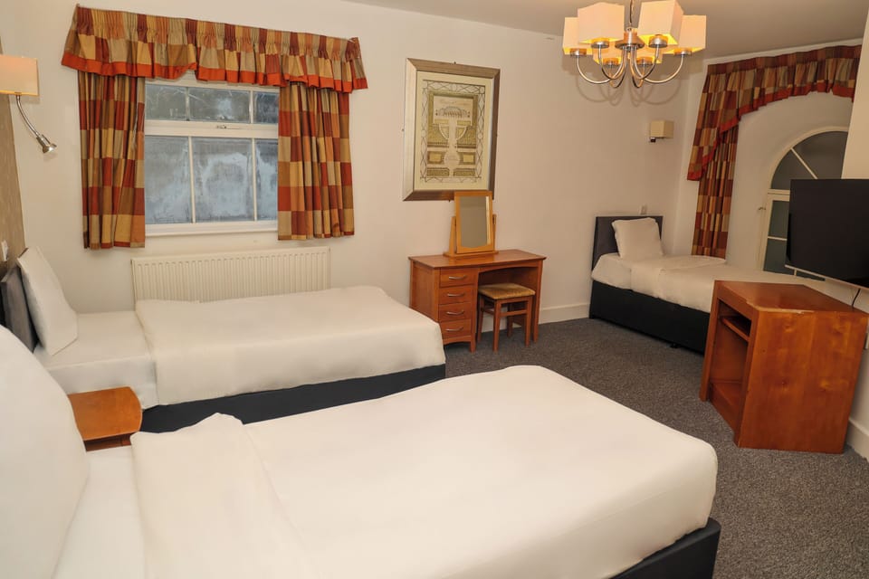 Standard Triple Room | Individually decorated, individually furnished, laptop workspace