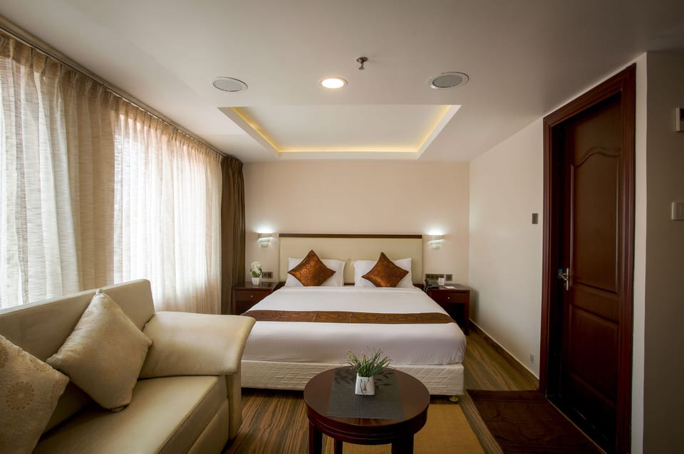 Elite Deluxe Room | Premium bedding, in-room safe, desk, soundproofing