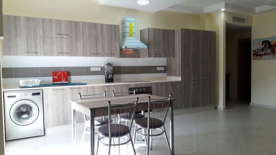 Apartment, 3 Bedrooms | Private kitchen | Full-size fridge, microwave, oven, electric kettle