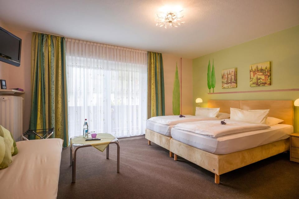 Hypo-allergenic bedding, minibar, in-room safe, desk