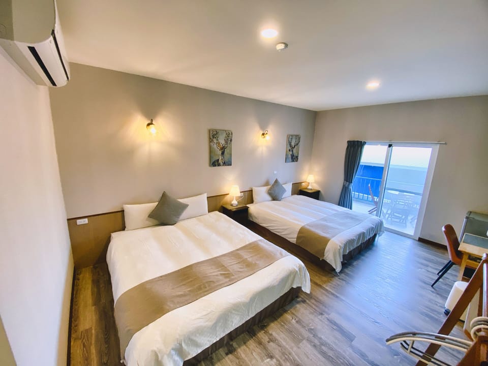 Premium bedding, down comforters, pillowtop beds, minibar