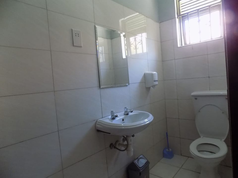 Shower, free toiletries, slippers, towels