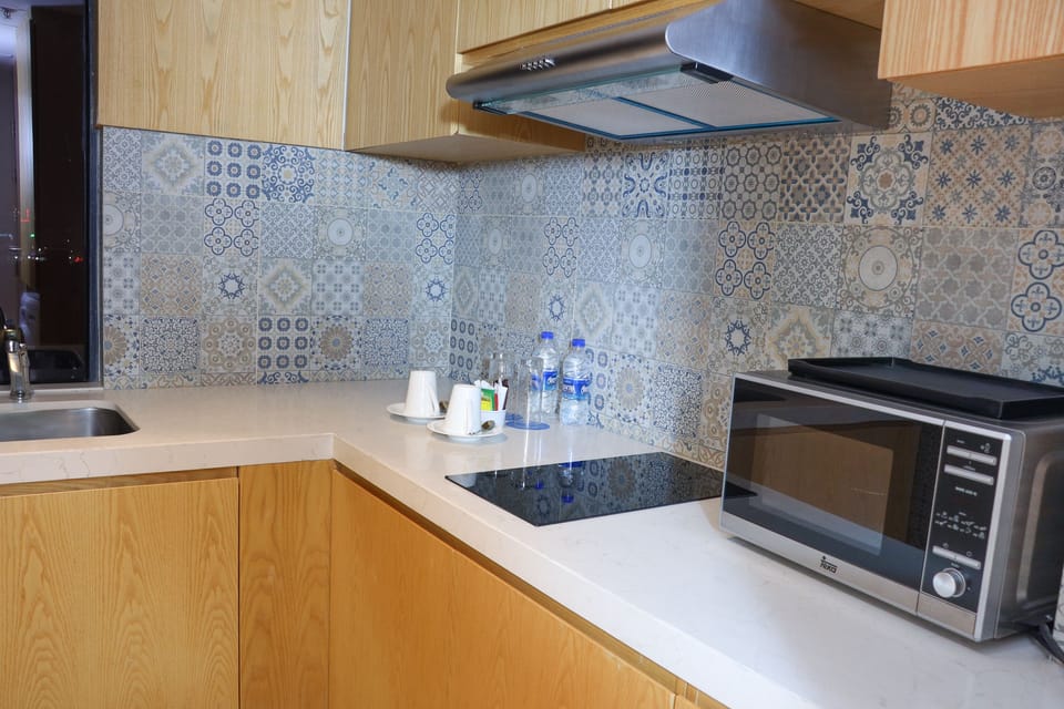 Royal Suite, 1 King Bed, Kitchen, City View | Private kitchen | Oven, coffee/tea maker, electric kettle