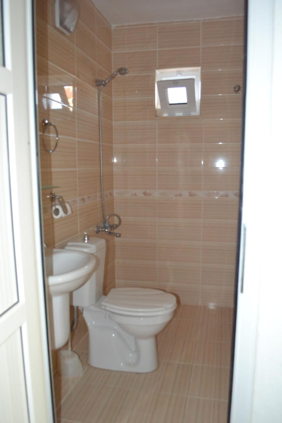 Shower, free toiletries, hair dryer, slippers