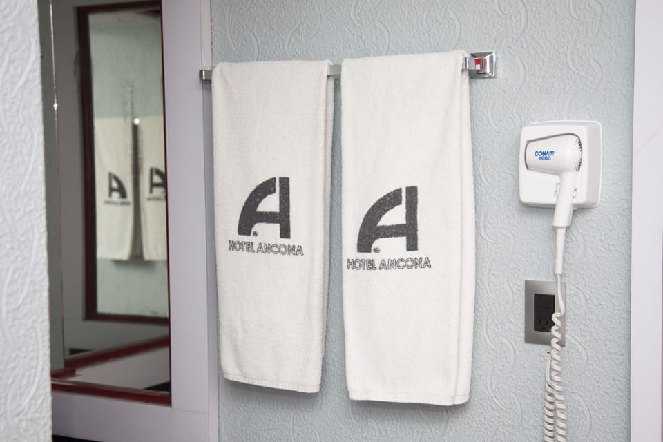 Basic Double Room, 1 Queen Bed | Bathroom | Shower, free toiletries, towels