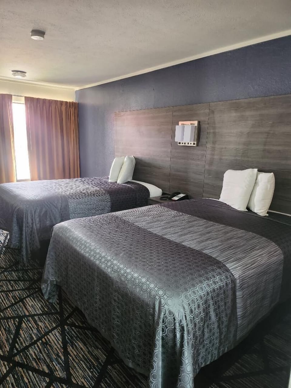 Blackout drapes, iron/ironing board, free WiFi, bed sheets