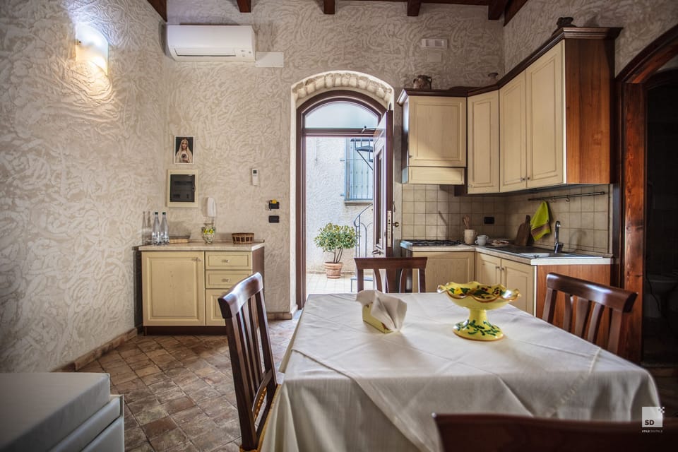 Comfort Apartment, Kitchenette, Partial Sea View | Living area | Flat-screen TV