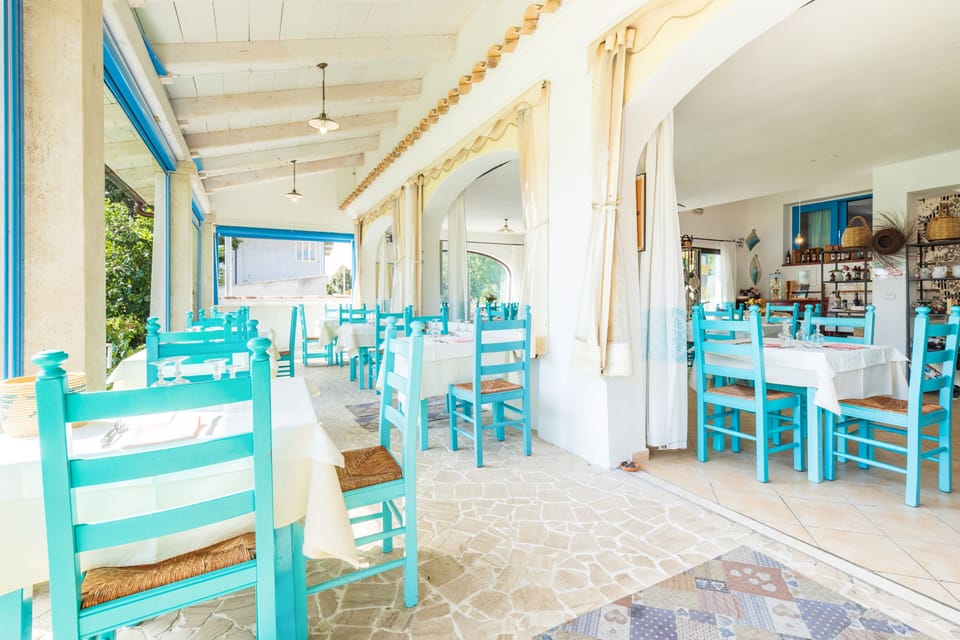 Dinner served, Mediterranean cuisine, garden views 