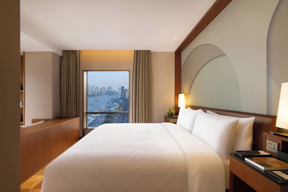 Shanghai Suite with River View | Egyptian cotton sheets, down comforters, pillowtop beds, minibar