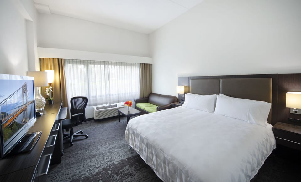 Premium bedding, down comforters, in-room safe, desk