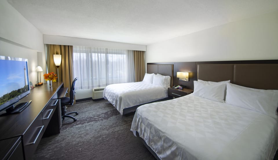 Premium bedding, down comforters, in-room safe, desk