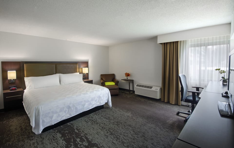 Premium bedding, down comforters, in-room safe, desk