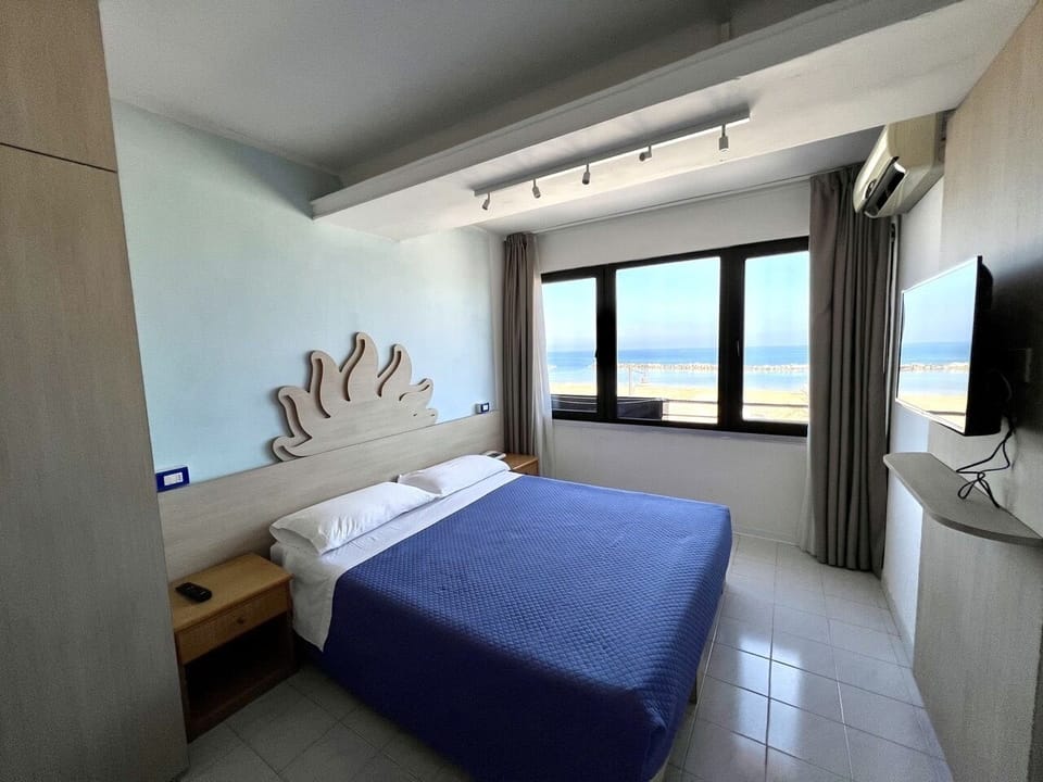 Desk, laptop workspace, free WiFi, bed sheets