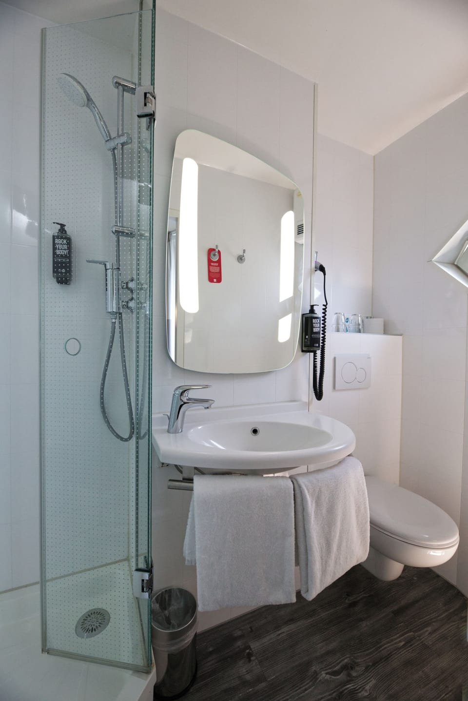 Shower, eco-friendly toiletries, hair dryer, towels