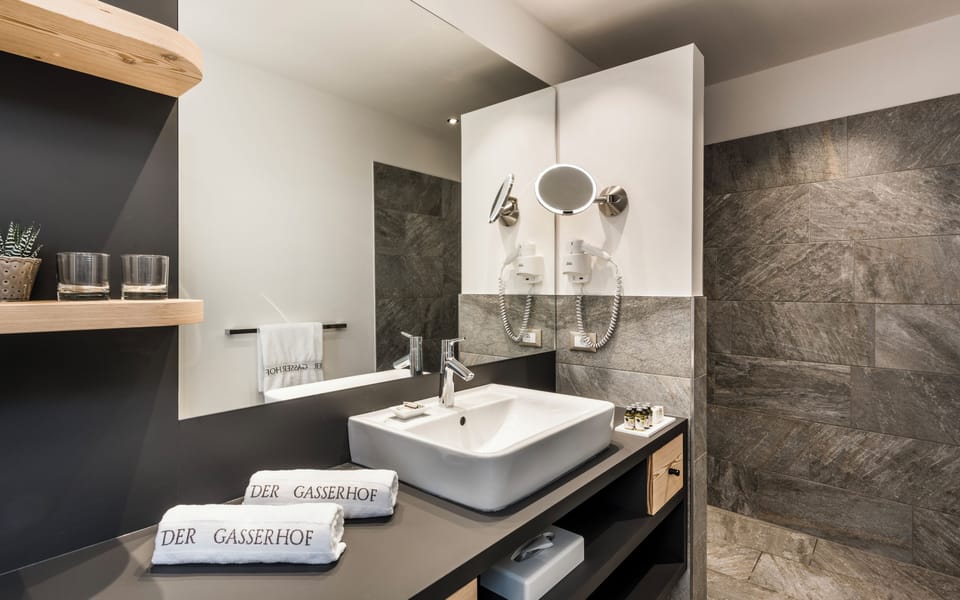 Junior Double Room, Balcony | Bathroom | Shower, rainfall showerhead, hair dryer, bathrobes