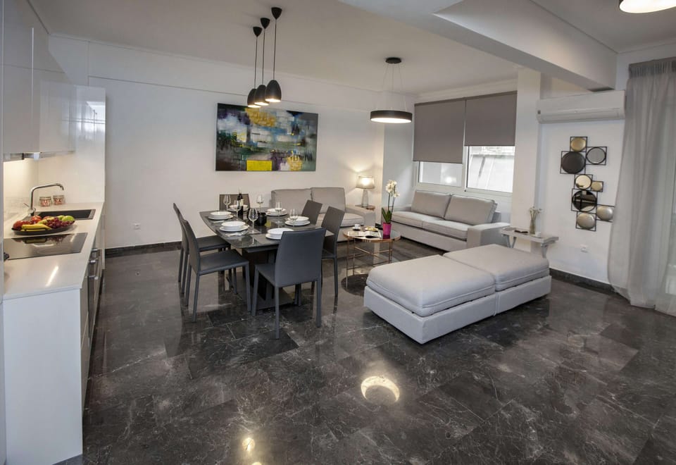 Family Apartment, 4 Bedrooms, Balcony | Living area | TV