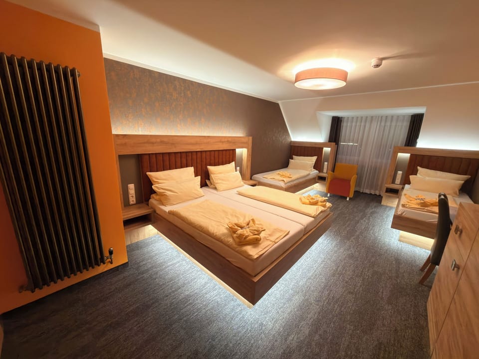 Comfort Triple Room (free public transport ticket) | Hypo-allergenic bedding, desk, blackout drapes, soundproofing