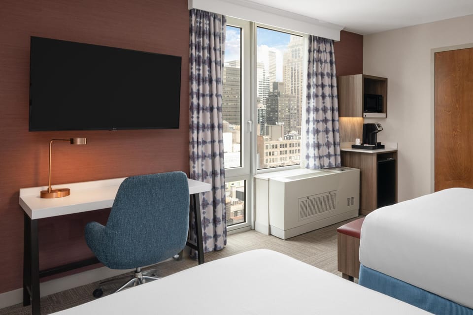 Premium bedding, down comforters, in-room safe, desk