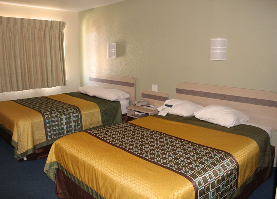 Basic Room, 2 Queen Beds, Smoking | Down comforters, free WiFi, bed sheets, alarm clocks