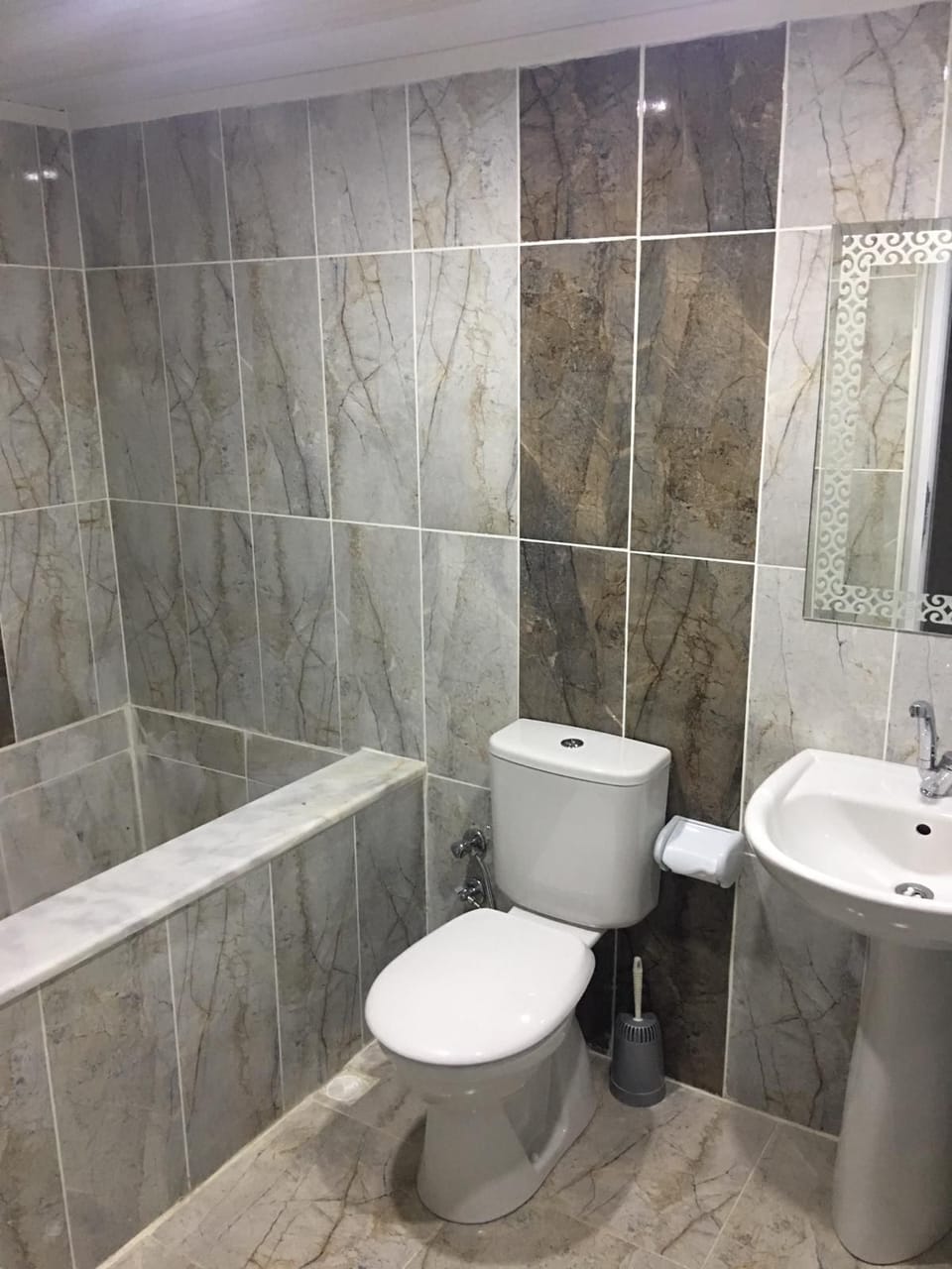 Bathtub, hair dryer, towels