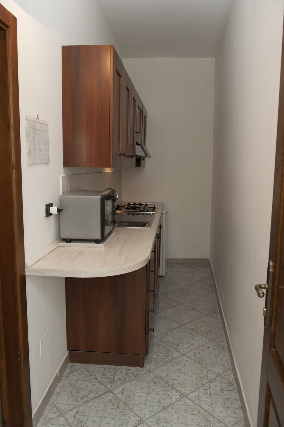 Fridge, stovetop, coffee/tea maker, cookware/dishes/utensils