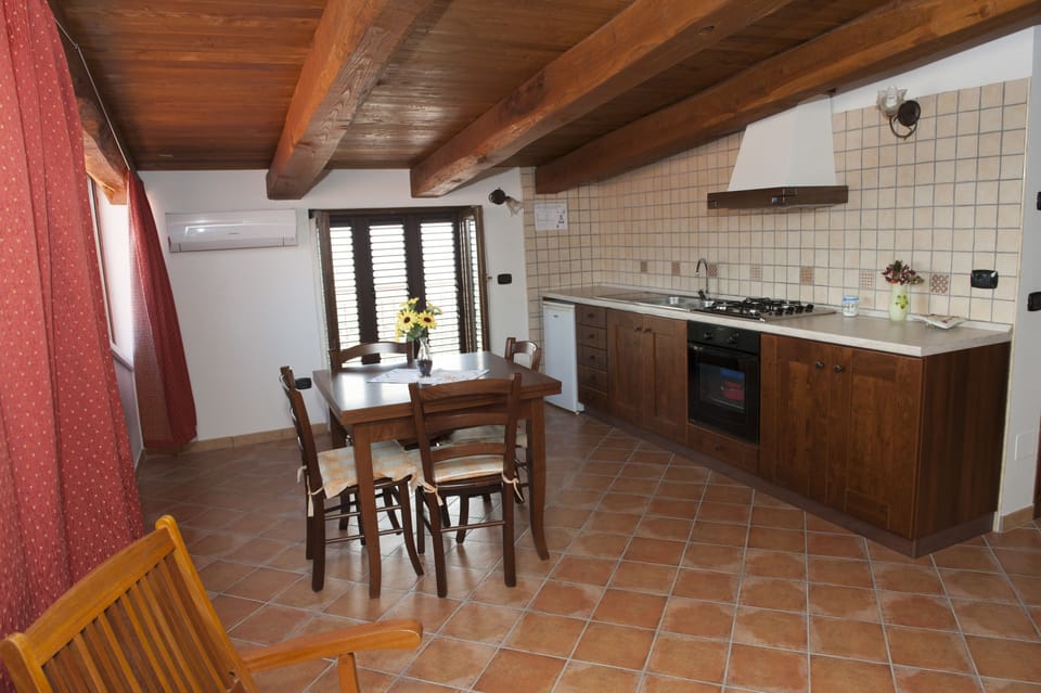 Apartment, 1 Bedroom, Private Bathroom | Private kitchenette | Fridge, stovetop, coffee/tea maker, cookware/dishes/utensils