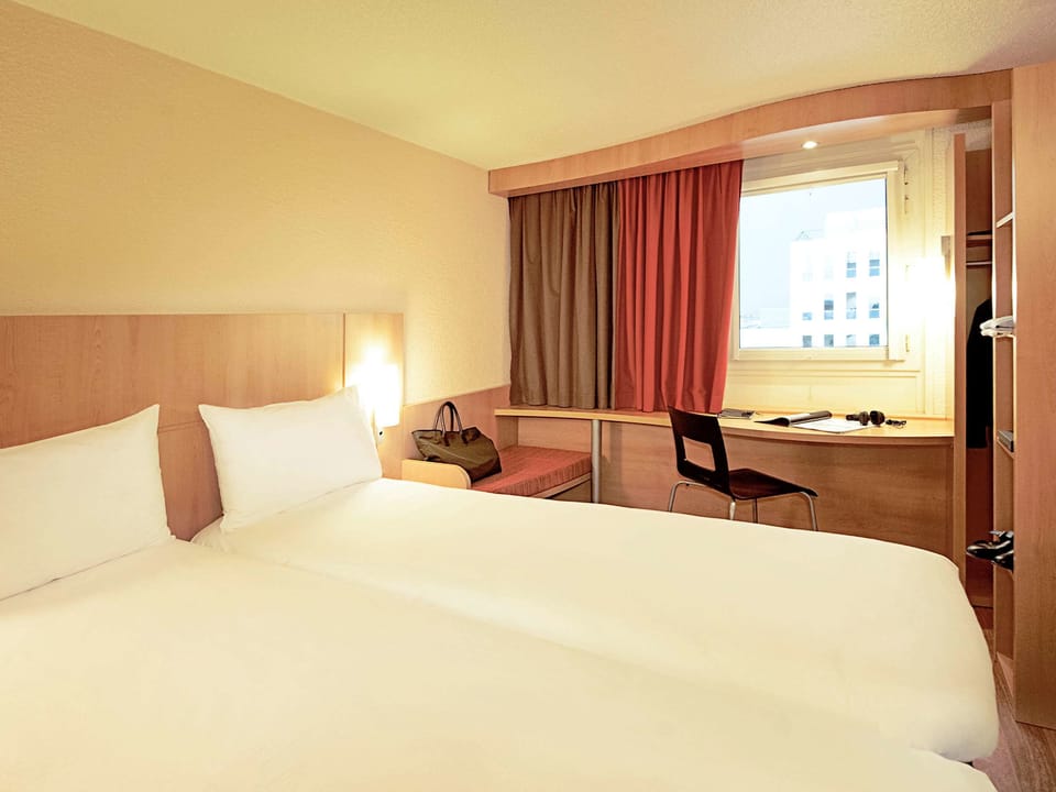 Premium bedding, pillowtop beds, desk, laptop workspace