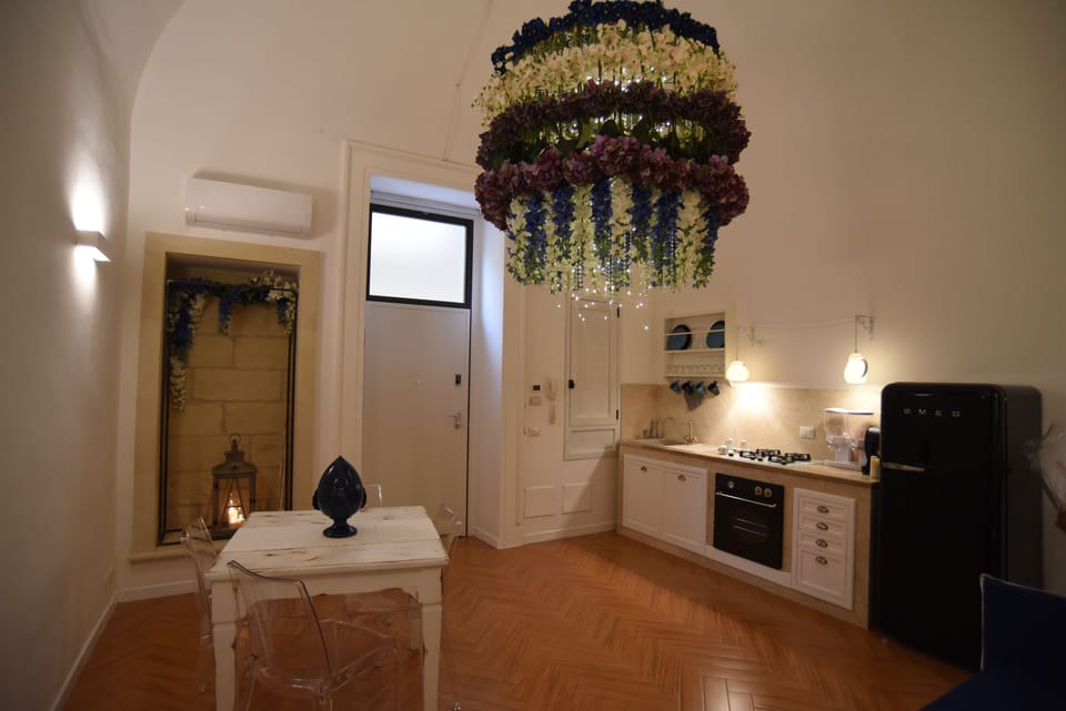 Superior Apartment | Living area | Flat-screen TV