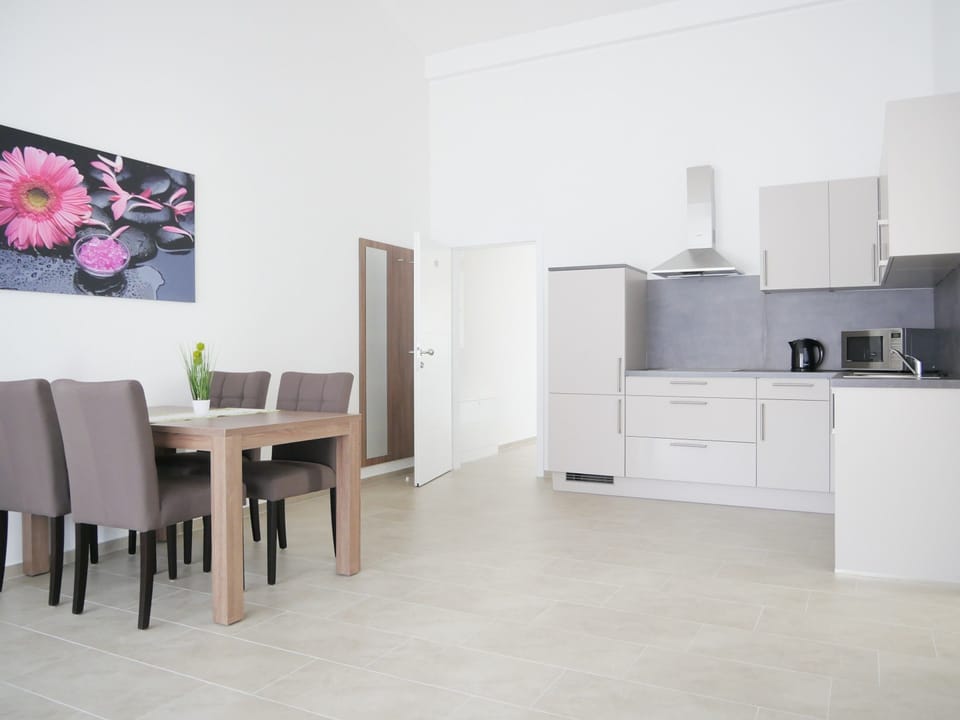 Family Apartment, 1 Bedroom, Non Smoking, Balcony | In-room dining