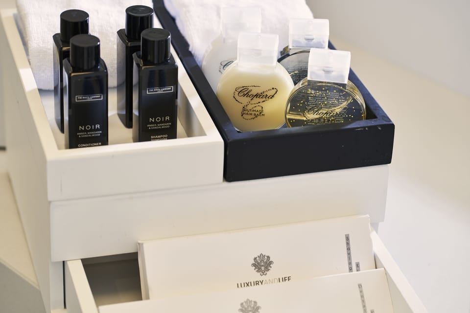 Suite, Private Pool, Sea View | Bathroom amenities | Designer toiletries, hair dryer, bathrobes, slippers