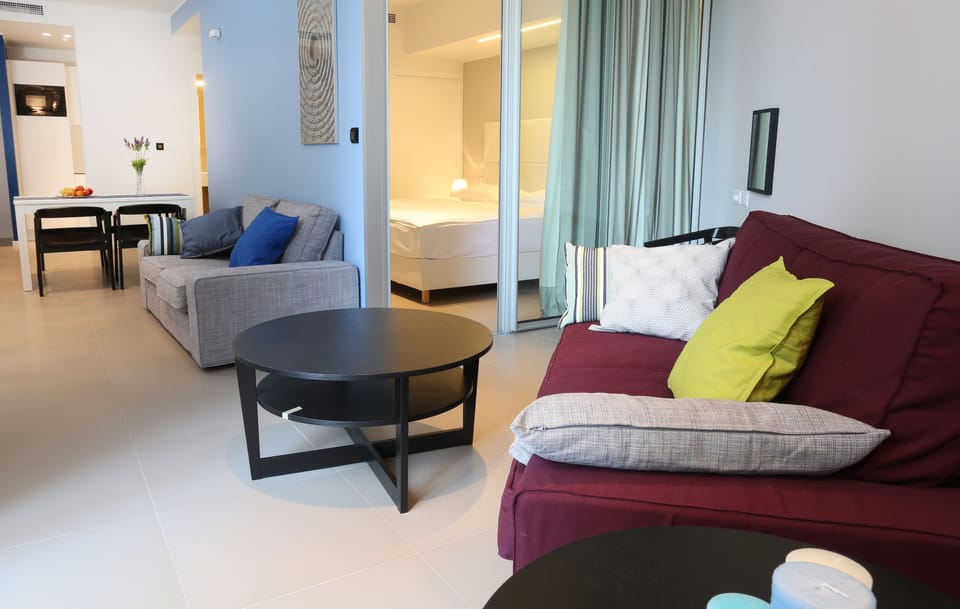 Apartment, 1 Bedroom | Living room | LCD TV