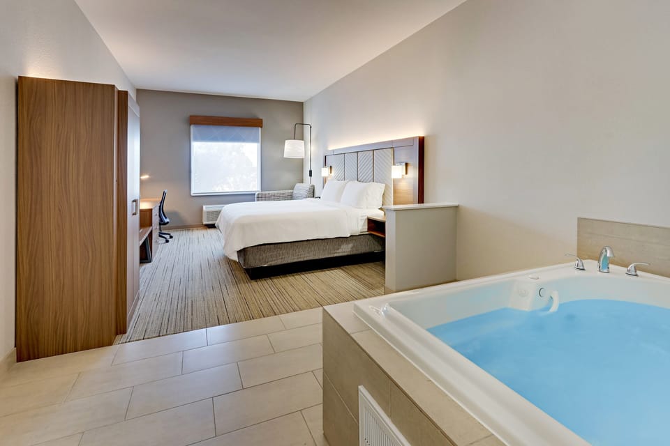 Premium bedding, down comforters, pillowtop beds, in-room safe