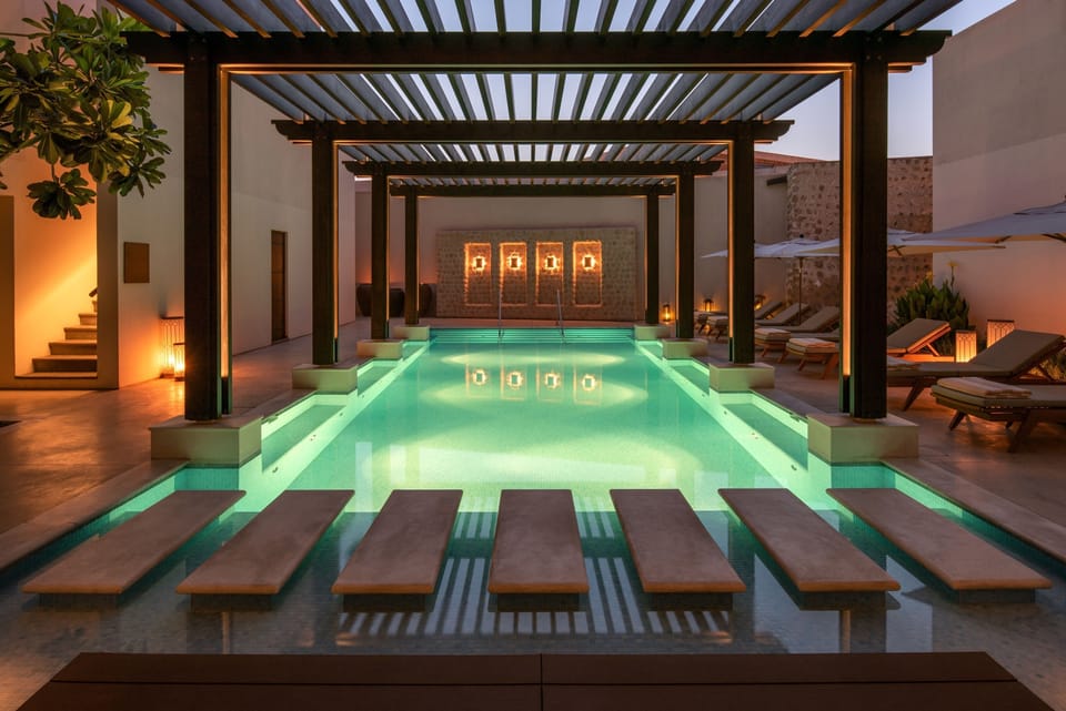 Outdoor pool, open 7 AM to 7 PM, pool umbrellas, sun loungers