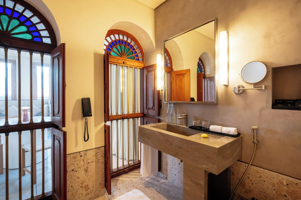 Superior Suite, 1 King Bed, Patio (Pearl Junior Suite) | Bathroom | Free toiletries, hair dryer, bathrobes, slippers