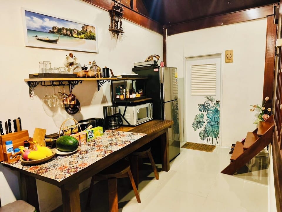 Full-size fridge, microwave, stovetop, coffee/tea maker