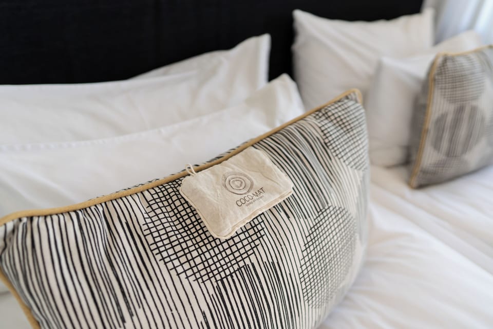 Deluxe Room | Premium bedding, in-room safe, blackout drapes, iron/ironing board