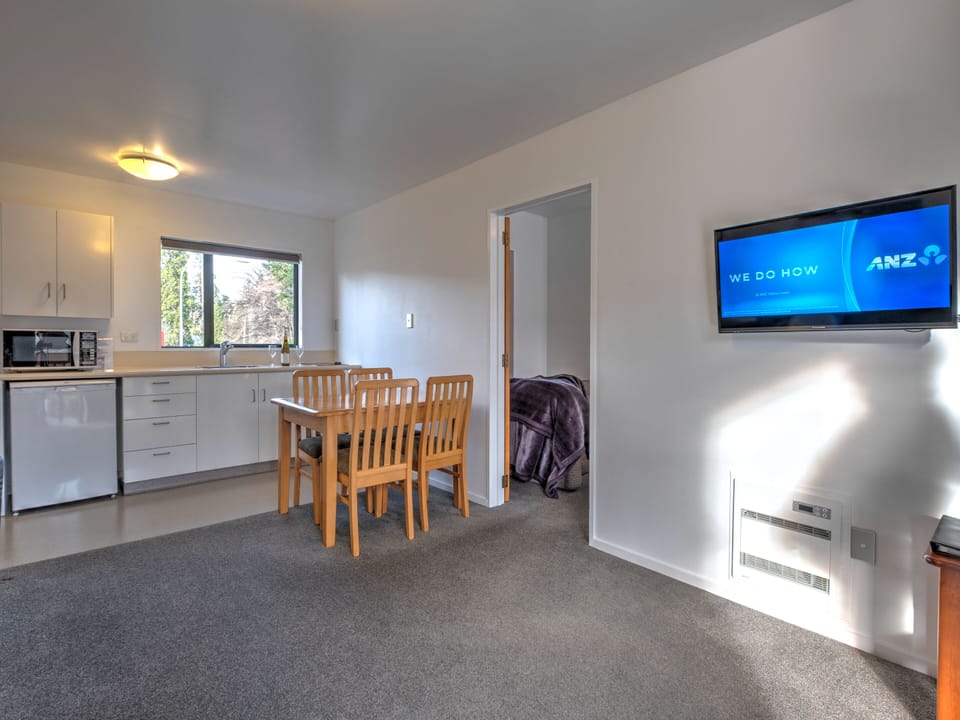 One Bedroom | Living area | 32-inch TV with satellite channels, DVD player
