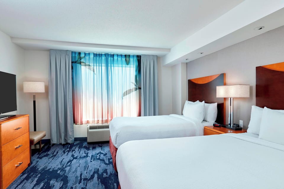 Premium bedding, down comforters, desk, blackout drapes