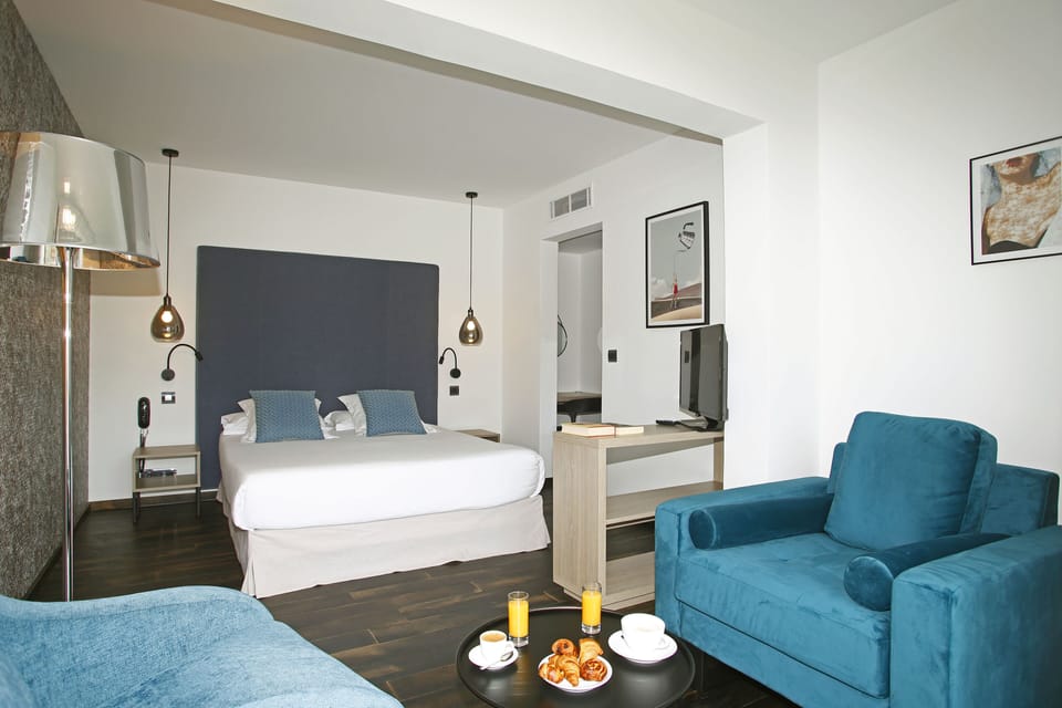 Superior Double Room, City View | Minibar, in-room safe, individually decorated, individually furnished