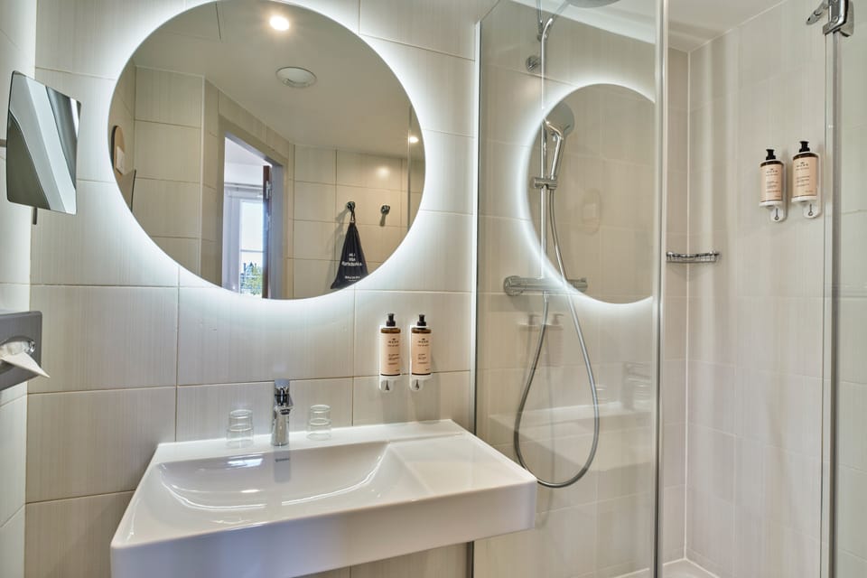 Eco-friendly toiletries, hair dryer, towels