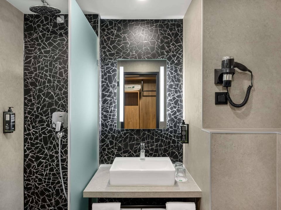 Eco-friendly toiletries, hair dryer, towels, soap